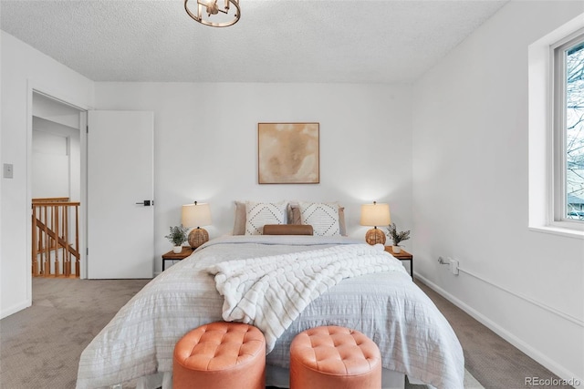 4248 Corriente Pl, Boulder, CO 80301 - bedroom with carpet flooring, a textured ceiling, and baseboards