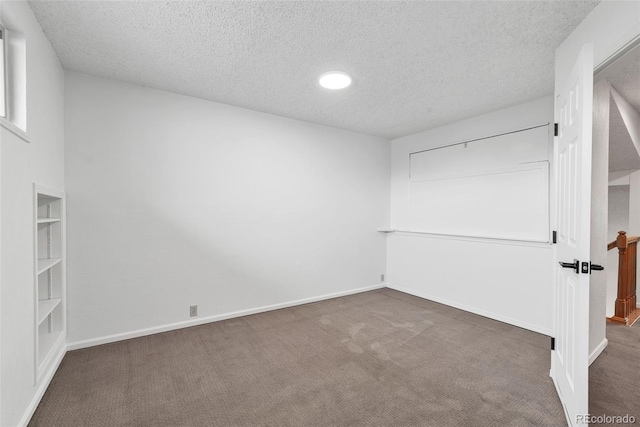 4248 Corriente Pl, Boulder, CO 80301 - carpeted spare room with a textured ceiling and baseboards