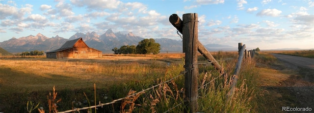 property view of mountains featuring a rural view