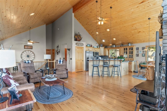 living room with wood ceiling and light wood-type flooring