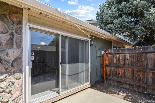 2246 N Coronado Pkwy Unit A, Denver, CO 80229 - view of exterior entry with stone siding