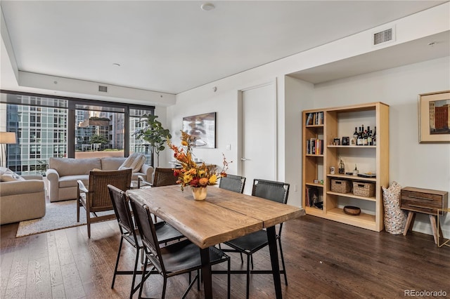 1750 Wewatta St Unit 525, Denver, CO 80202 - dining room featuring dark wood finished floors