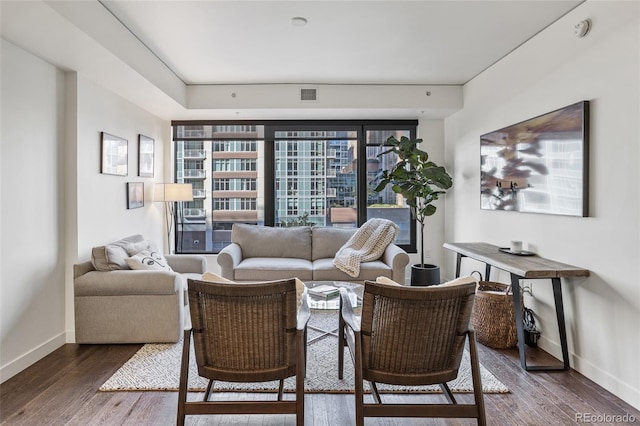 1750 Wewatta St Unit 525, Denver, CO 80202 - living room with baseboards and wood finished floors