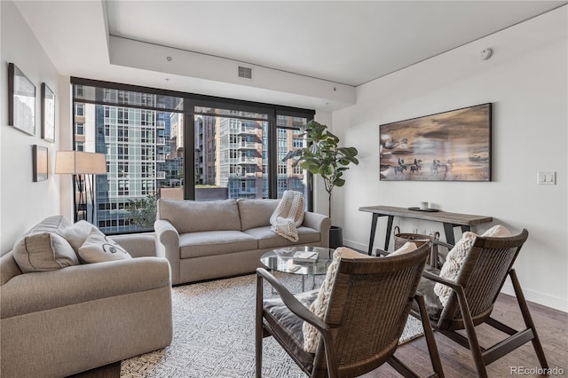 1750 Wewatta St Unit 525, Denver, CO 80202 - living area featuring baseboards and wood finished floors