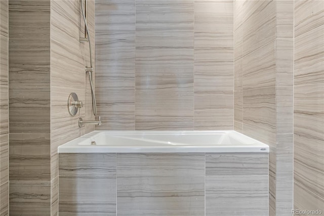1750 Wewatta St Unit 525, Denver, CO 80202 - bathroom with a tub to relax in and tile walls