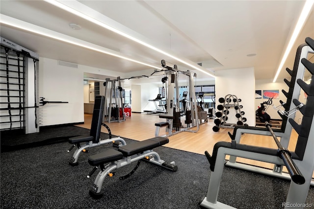 1750 Wewatta St Unit 525, Denver, CO 80202 - gym featuring wood finished floors