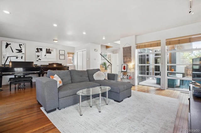 190 W Archer Pl, Denver, CO 80223 - living room with wood-type flooring and recessed lighting