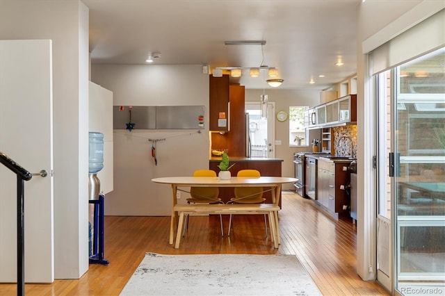 190 W Archer Pl, Denver, CO 80223 - dining room with light wood finished floors