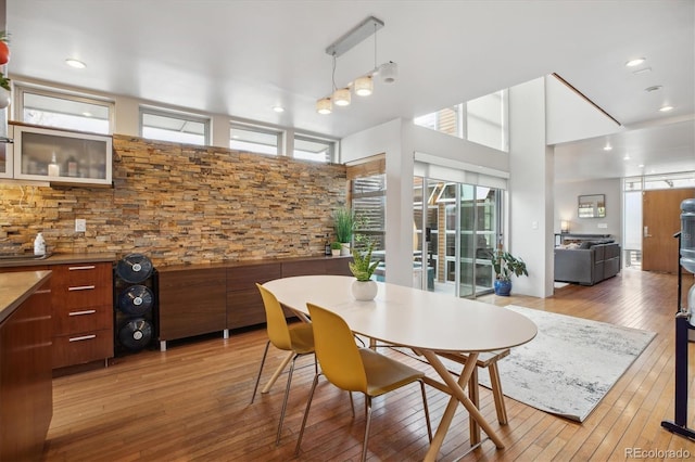 190 W Archer Pl, Denver, CO 80223 - dining space with plenty of natural light, recessed lighting, and hardwood / wood-style floors