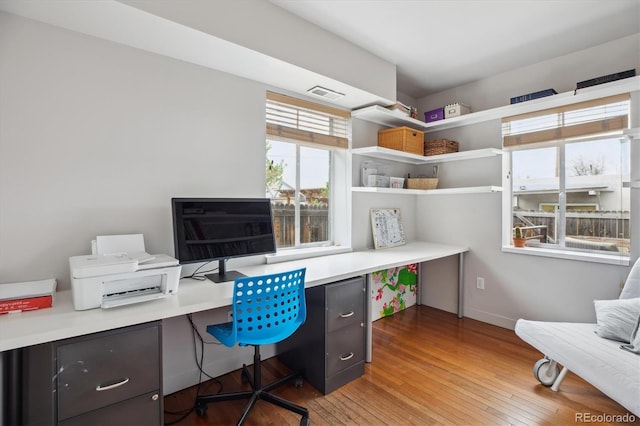 190 W Archer Pl, Denver, CO 80223 - office with light wood-style floors, baseboards, and visible vents