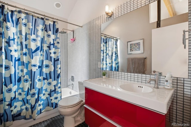 190 W Archer Pl, Denver, CO 80223 - full bathroom featuring tile walls, tile patterned flooring, toilet, and shower / tub combo with curtain