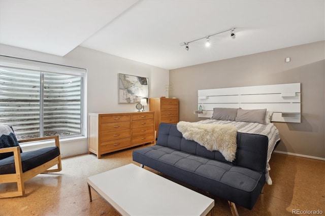 190 W Archer Pl, Denver, CO 80223 - bedroom featuring baseboards and rail lighting