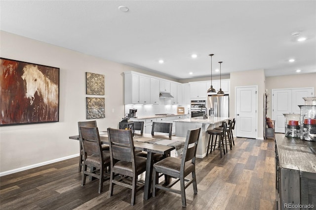 4475 Hidden Gulch Rd, Castle Rock, CO 80104 - dining room featuring dark wood-style floors, recessed lighting, and baseboards