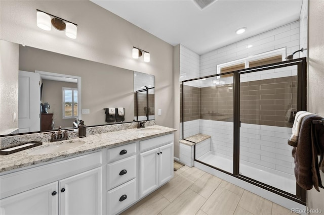 4475 Hidden Gulch Rd, Castle Rock, CO 80104 - full bath featuring a shower stall and double vanity