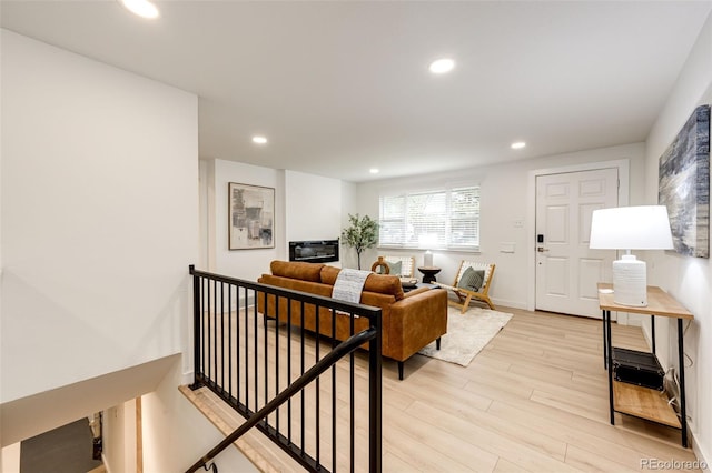5780 W 5th Ave, Lakewood, CO 80226 - living area featuring light wood-style flooring and recessed lighting