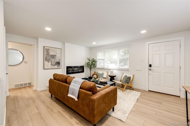 5780 W 5th Ave, Lakewood, CO 80226 - living room featuring light wood-style floors and recessed lighting
