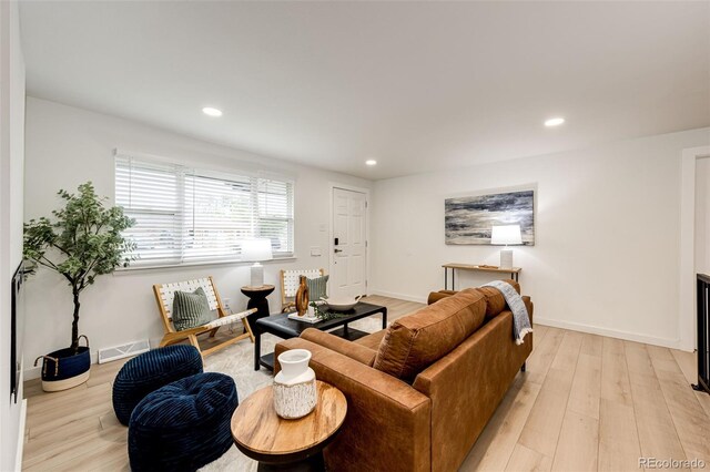 5780 W 5th Ave, Lakewood, CO 80226 - living area with recessed lighting and light wood finished floors