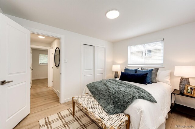 5780 W 5th Ave, Lakewood, CO 80226 - bedroom with light wood finished floors, a closet, and recessed lighting