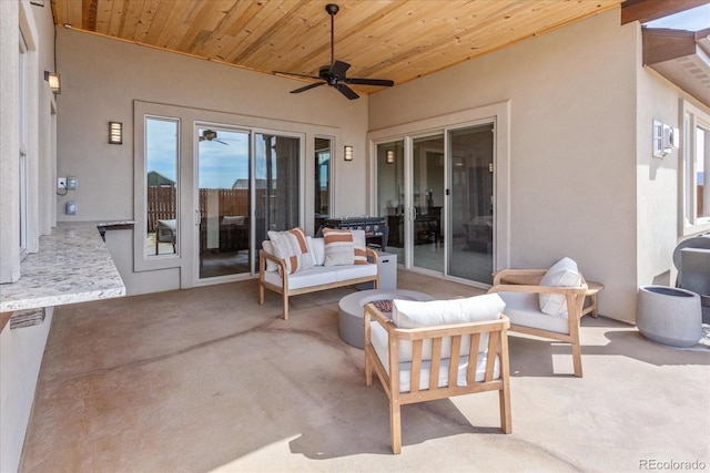 view of patio featuring ceiling fan