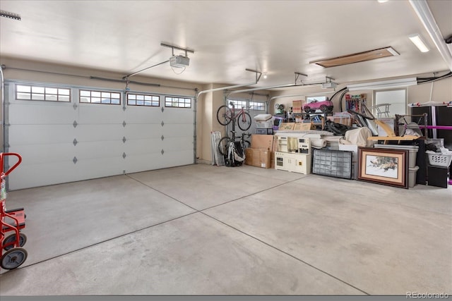 garage featuring a garage door opener
