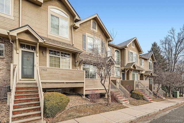 view of front of home featuring a wooden deck