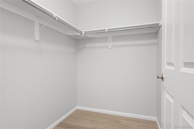 4385 S Balsam St Unit 5-104, Littleton, CO 80123 - spacious closet featuring wood finished floors