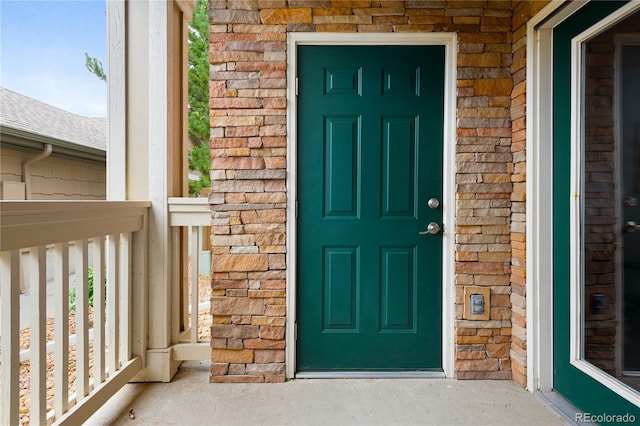 4385 S Balsam St Unit 5-104, Littleton, CO 80123 - doorway to property with brick siding