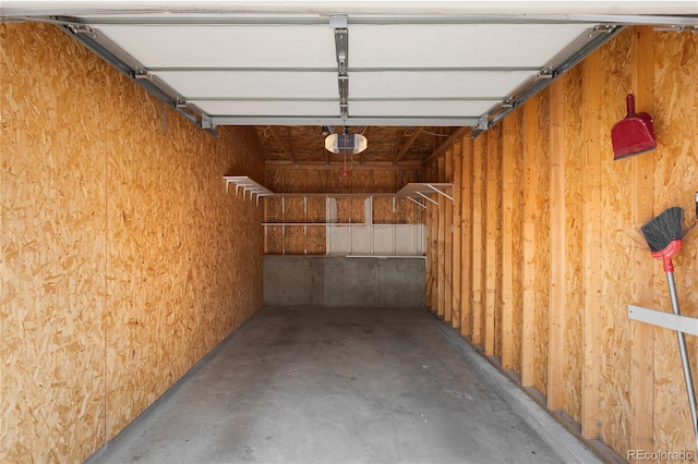 4385 S Balsam St Unit 5-104, Littleton, CO 80123 - garage featuring a garage door opener