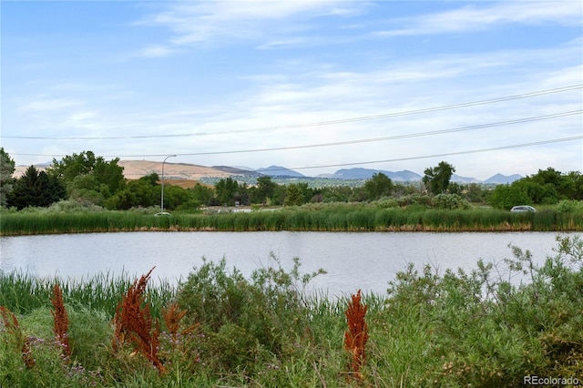 4385 S Balsam St Unit 5-104, Littleton, CO 80123 - water view featuring a mountainous background