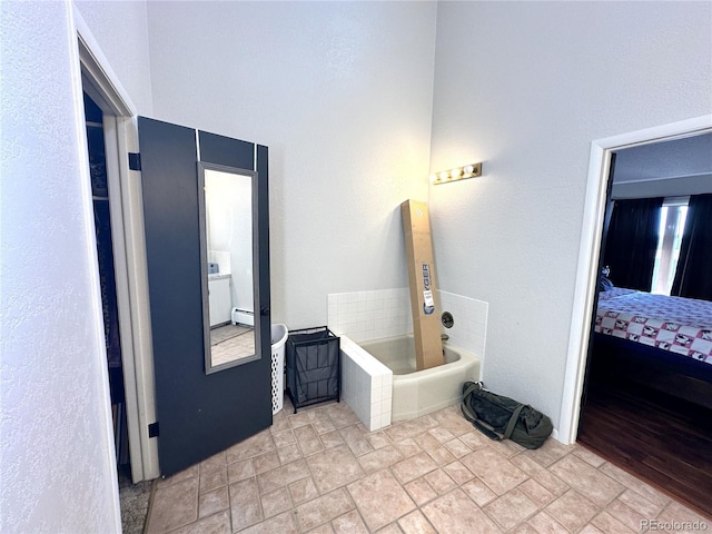 bathroom featuring a tub