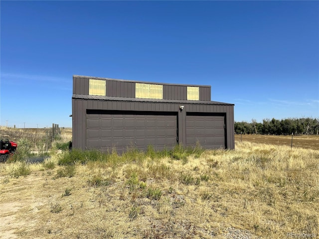 garage with a rural view