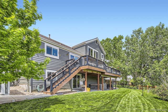 9229 Sugarstone Cir, Highlands Ranch, CO 80130 - rear view of house with a hot tub, stairway, a yard, and a deck