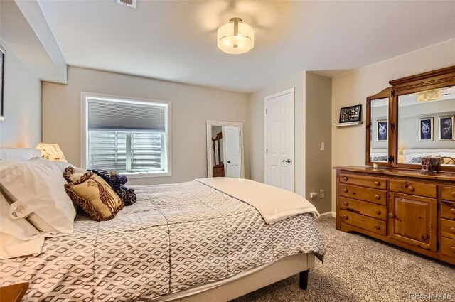 9229 Sugarstone Cir, Highlands Ranch, CO 80130 - bedroom featuring light colored carpet