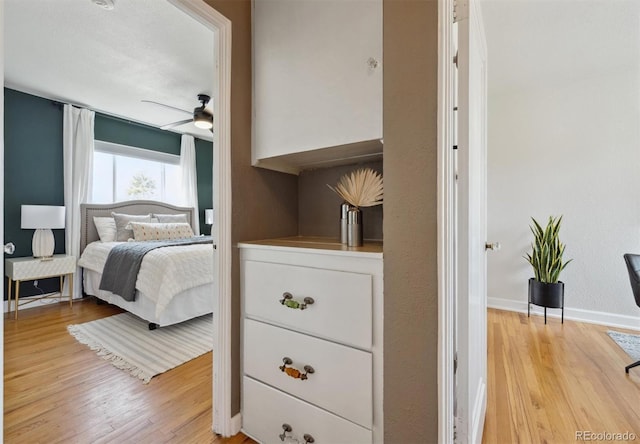 1610 Trenton St, Denver, CO 80220 - bedroom featuring light wood-style flooring and baseboards