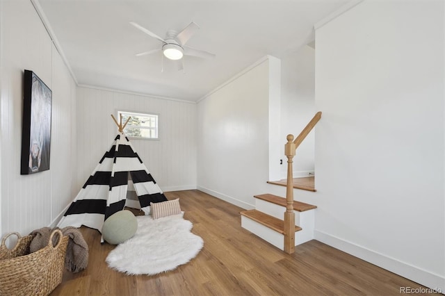 1610 Trenton St, Denver, CO 80220 - sitting room featuring a ceiling fan, wood finished floors, baseboards, and ornamental molding