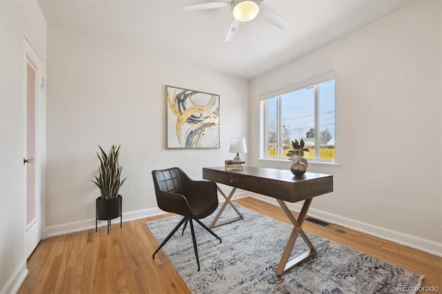 1610 Trenton St, Denver, CO 80220 - office area with visible vents, ceiling fan, baseboards, and wood finished floors