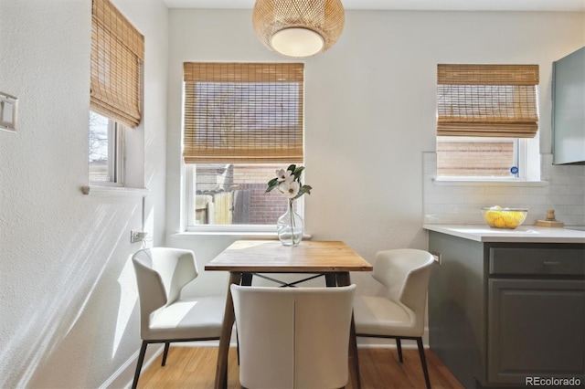 1610 Trenton St, Denver, CO 80220 - dining area with baseboards and wood finished floors