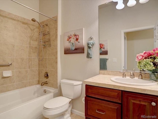 bathroom featuring toilet, shower / bath combination, and vanity