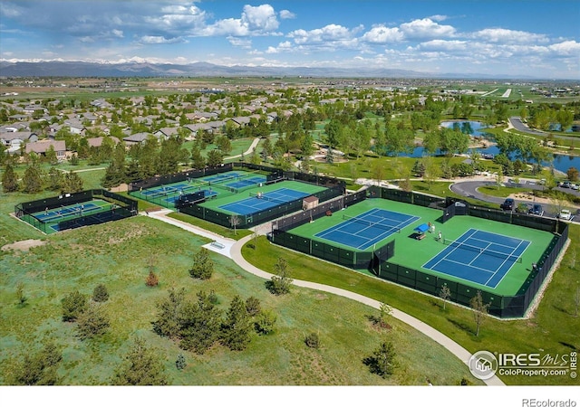 bird's eye view featuring a residential view and a water and mountain view