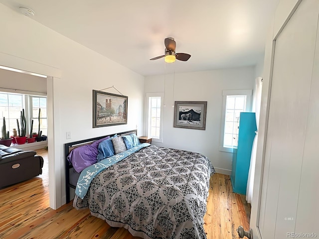 601 N Wood St, Silver Cliff, CO 81252 - bedroom with light wood-type flooring and a ceiling fan