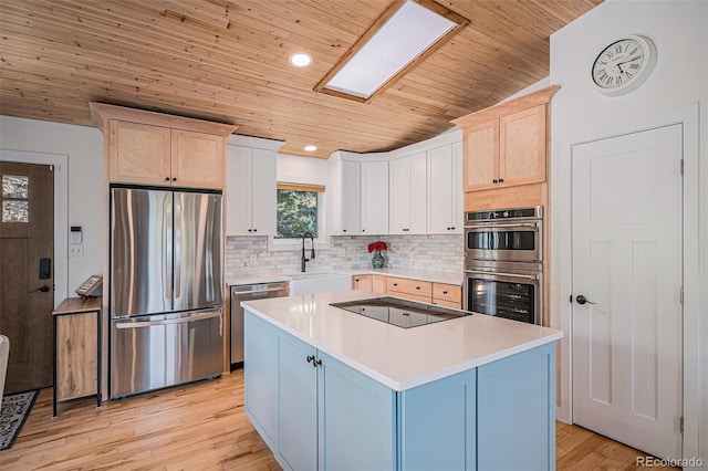 32783 Lodgepole Cir, Evergreen, CO 80439 - kitchen featuring stainless steel appliances, wood ceiling, decorative backsplash, light countertops, and light wood-style flooring