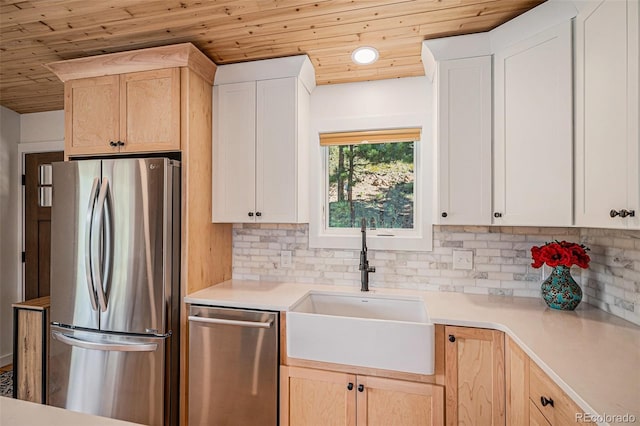 32783 Lodgepole Cir, Evergreen, CO 80439 - kitchen featuring stainless steel appliances, wood ceiling, tasteful backsplash, light countertops, and light brown cabinets
