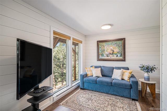 32783 Lodgepole Cir, Evergreen, CO 80439 - living area with wood finished floors and wooden walls