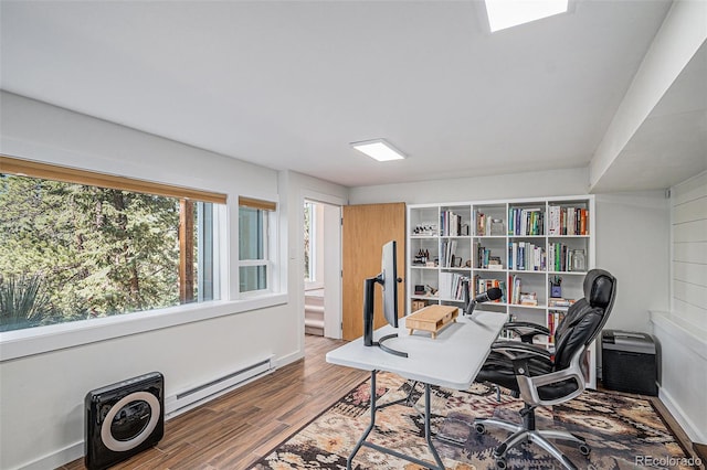 32783 Lodgepole Cir, Evergreen, CO 80439 - office space with baseboard heating and wood finished floors