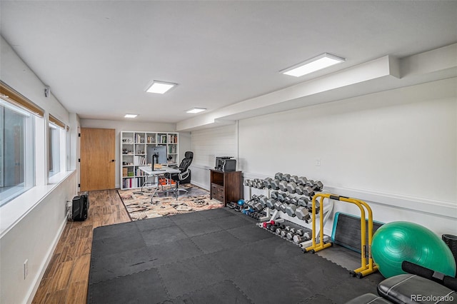 32783 Lodgepole Cir, Evergreen, CO 80439 - workout area with wood finished floors and baseboards