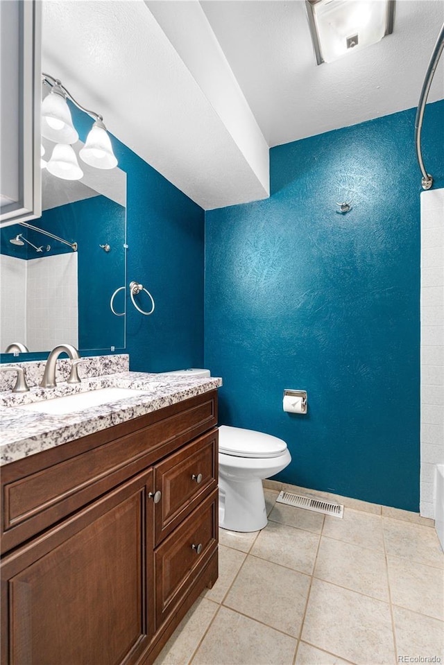 17503 E Lasalle Dr, Aurora, CO 80013 - bathroom with vanity, tile patterned flooring, and  shower combination