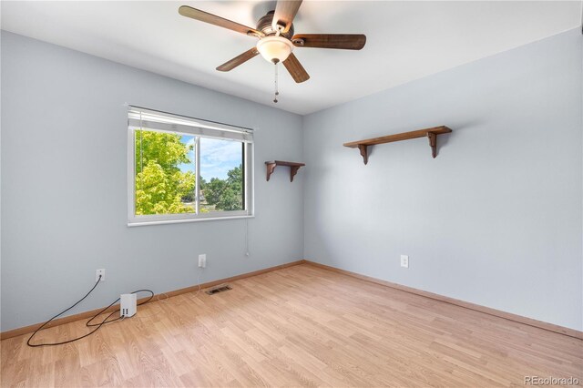 17503 E Lasalle Dr, Aurora, CO 80013 - spare room featuring wood finished floors and a ceiling fan