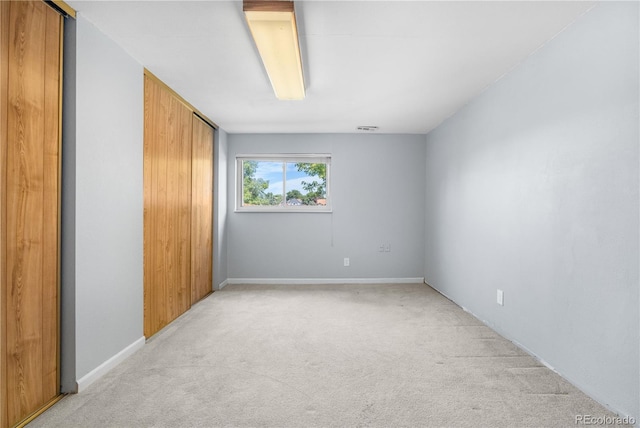 17503 E Lasalle Dr, Aurora, CO 80013 - unfurnished bedroom featuring light colored carpet and a closet