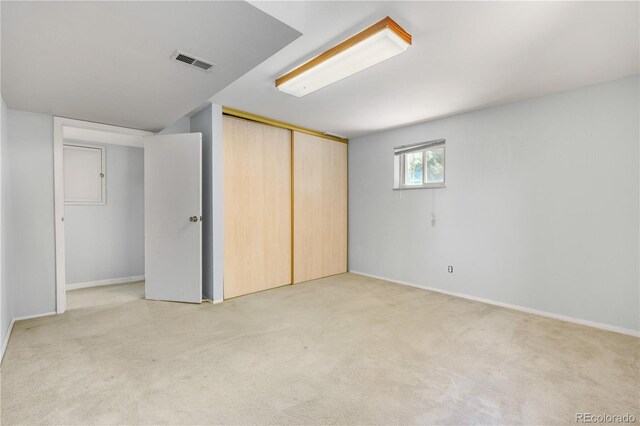 17503 E Lasalle Dr, Aurora, CO 80013 - unfurnished bedroom featuring light colored carpet and a closet