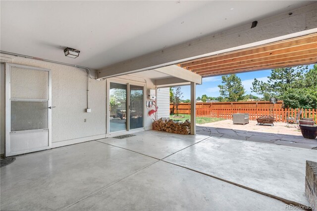 17503 E Lasalle Dr, Aurora, CO 80013 - view of patio featuring a fire pit